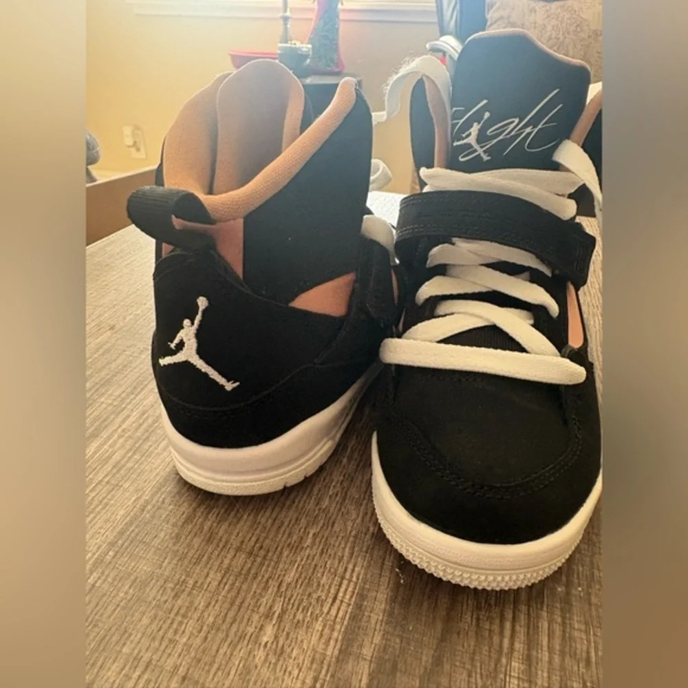 Jordan Kids Black and White Sneakers with Orange Accents